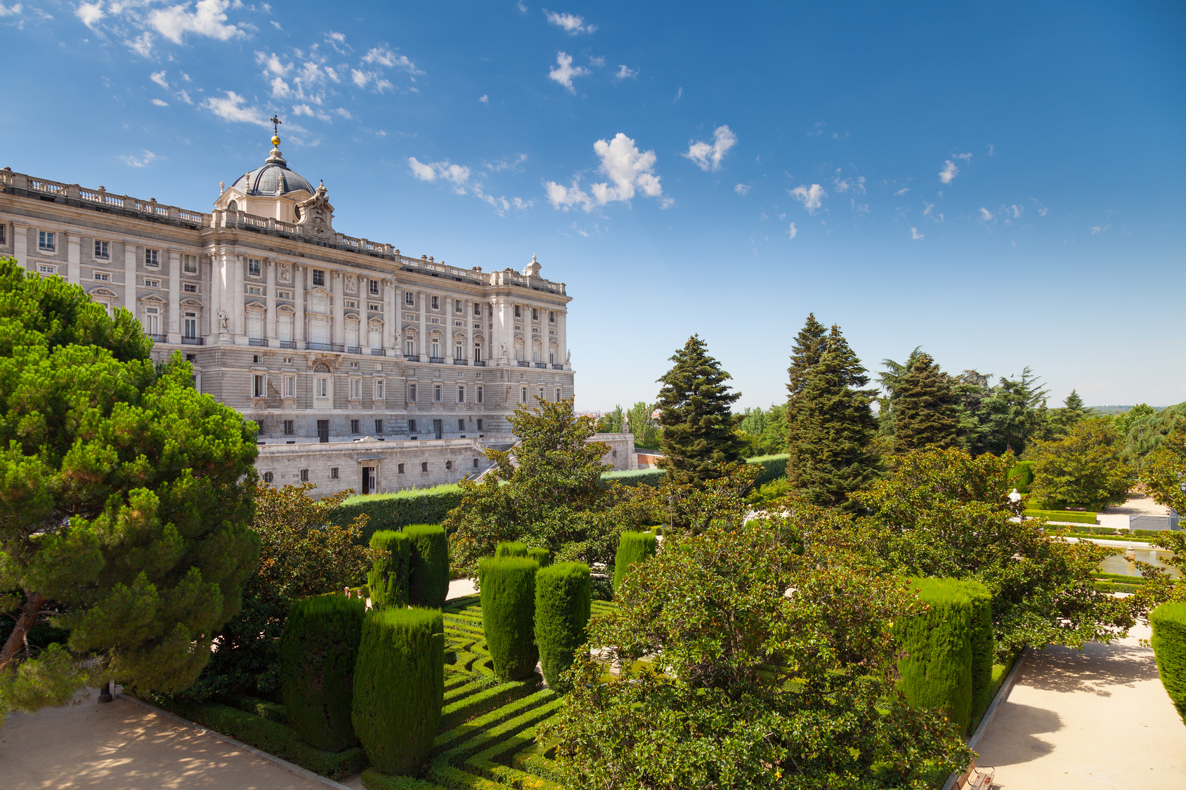 Facade of Madrid Royal Palace and Sabatini Gardens, Madrid, Spain